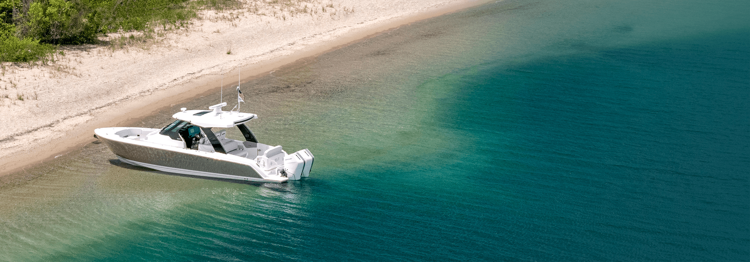 Tiara Yachts 35 LS anchored at beach in Harbor Springs, Michigan