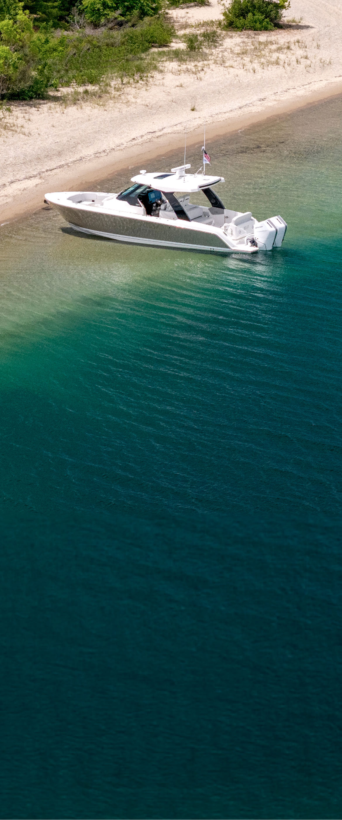 Tiara Yachts 35 LS anchored at beach in Harbor Springs, Michigan