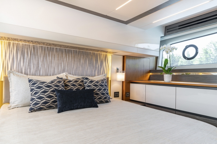 Tiara Yachts 49 Coupe | Owner's stateroom and port side dresser