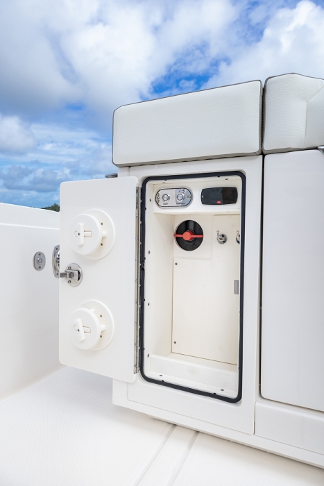 Tiara Yachts 34 LS | Control panel for freezer chiller plate and livewell, along with storage