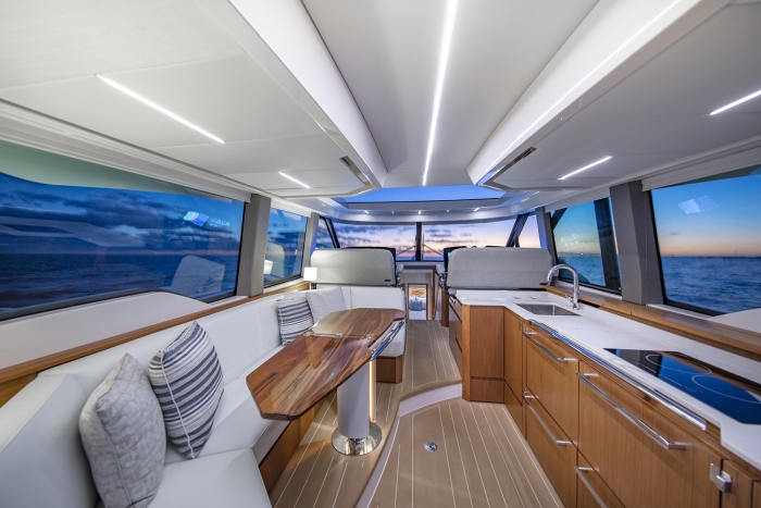 Tiara Yachts EX 60 | Portside Lounge and Starboard Galley