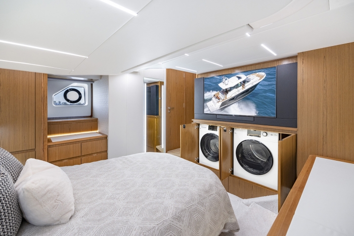 Tiara Yachts EX 54 | Owner's Stateroom with Side-by-Side Washer and Dryer