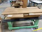 Solid teak boards being prepared for high gloss varnish finish