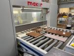 Makor machine varnishes cabin parts through an automated spray process and cures pieces in its drying oven