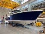 Your boat is in shipping prep area; alll loose items such as dock lines, fenders, propellers, operator manuals, pillows, etc. are loaded on