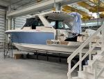 Once the cover is secure, you boat is be loaded onto the truck and shipped. 