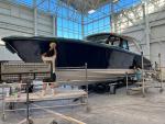 Hull sides are polished and buffed multiple times to accomplish a flawless finish